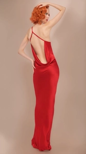 Detail of elegant backless satin red dress with sophisticated draped back cowl neck design