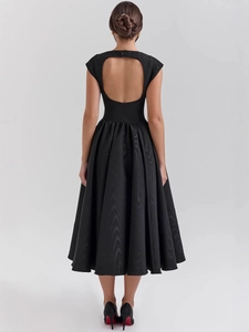 Elegant backless black midi dress with U-shaped cutout and pleated satin skirt