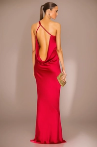 Close-up of the backless cowl neck detail on this elegant red satin evening gown