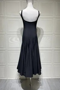 Detail of the back zipper and flowing flared hem of this black French sundress