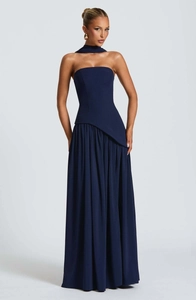 Detail of navy blue tube top dress with asymmetrical waist cut and matching neck scarf