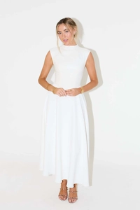 Close-up of elegant white sleeveless maxi dress with a sophisticated high-neck design