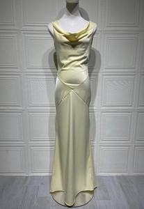 Detail of elegant cowl neck and sleeveless design on a long cream satin evening dress