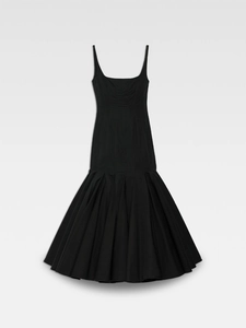 Elegant French style black slip dress with waist-slimming pleats and a flared hemline