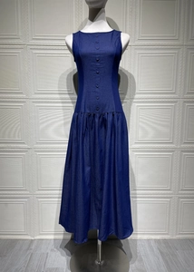 Detailed view of the button-front closure and pleats on a dark blue sleeveless maxi dress