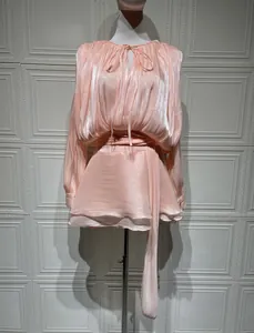 French retro peach pink pleated dress with sateen luster and tie neck detail