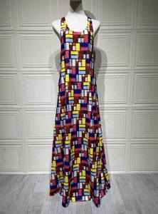 Detail of colorful geometric print sleeveless maxi dress with bold color block patterns