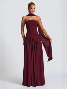 Elegant strapless burgundy slit maxi dress with draped bodice and matching neck scarf