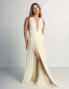 Detail of elegant off-white infinity dress featuring draped halter neck and waist ties