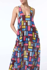 Deep V-neck detail on sleeveless long dress with colorful geometric block print