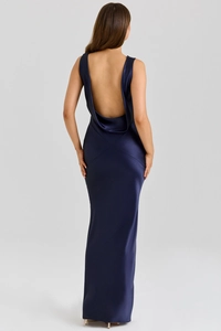 Detail view of the elegant deep blue satin dress showing the cowl back and drapes