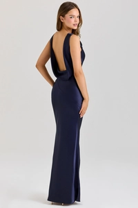 Elegant deep blue satin dress featuring a low back draping detail and slim silhouette