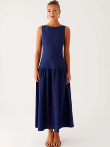 Navy blue sleeveless denim maxi dress with button-up bodice and tiered pleated hem skirt