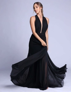 Detail of multi-layer black tulle hem on elegant halter neck pleated evening gown