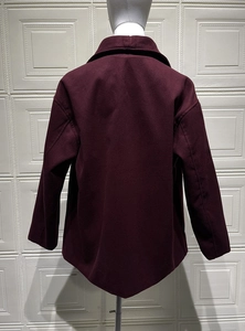 Back view of wine red wool coat showing professional tailoring and thick texture