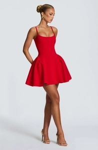 Detail of red strapless A-line mini dress with slim bodice and flared puffy skirt