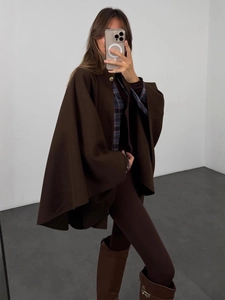 Elegant dark brown wool cape coat for women featuring a stylish gold button closure
