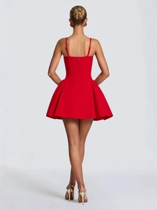 Chic back view of a vibrant red strapless mini dress with a pleated A-line puffy skirt