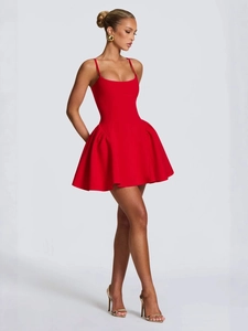 Chic red strapless mini dress with spaghetti straps and a voluminous puffy skirt silhouette