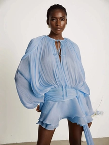 Elegant light blue pleated mini dress with lantern sleeves and tie-neck detail