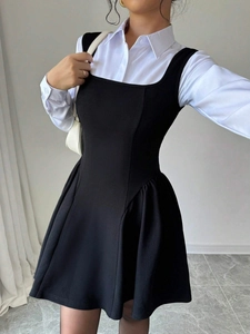Elegant two-piece set featuring a white satin long sleeve shirt and black square neck dress