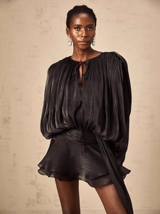 French style black pleated two-piece set with puff sleeve tie-up top and ruffled mini skirt