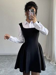 Elegant two-piece set featuring white long sleeve shirt and black square neck pinafore dress