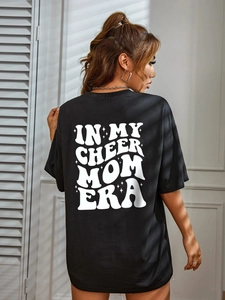 Black loose fit T-shirt featuring 'IN MY CHEER MOM ERA' back print and round neck design