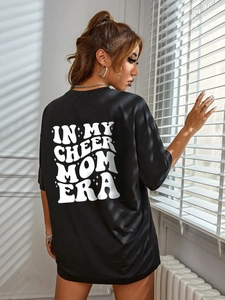 Women's black oversized cotton T-shirt with IN MY CHEER MOM ERA back print