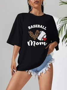 Close-up of Baseball Mom leopard heart print on black oversized cotton t-shirt