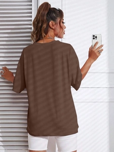 Rear view of coffee brown oversized T-shirt featuring dropped shoulders and relaxed fit