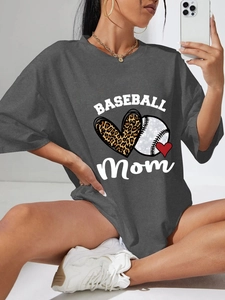 Detail view of oversized dark grey t-shirt featuring a leopard print Baseball Mom design