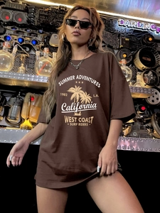 Oversized dark brown cotton T-shirt with California vintage print in a neon lab setting