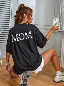 Oversized black crewneck T-shirt for women with white MOM print and names on the back