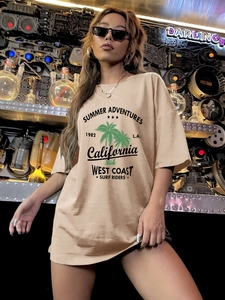 Detail of California palm tree print on oversized beige cotton blend t-shirt