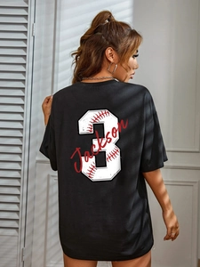 Oversized black t-shirt with white number 3 and red Jackson print on the back