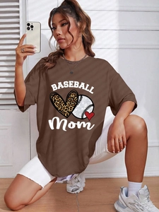 Detail showing oversized brown t-shirt with Baseball Mom print and leopard heart