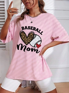 Detail of Baseball Mom print and leopard heart on pink loose fit short sleeve t-shirt