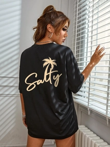 Oversized black cotton T-shirt featuring Salty lettering and palm tree print on the back