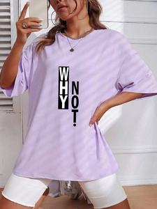Close-up of lilac cotton T-shirt featuring a WHY NOT! slogan print in a casual style