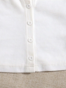 Slim fit white ribbed knit sleeveless tank top with square neck and button detail
