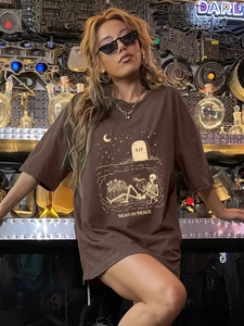 Dark brown oversized crewneck t-shirt with Read In Peace skull print and loose fit style