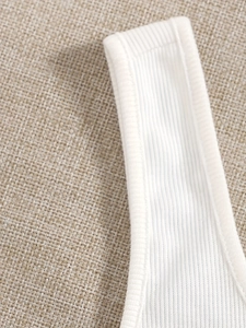 Slim fit white ribbed tank top for women featuring a sexy square neck and sleeveless design
