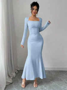 Detail of light blue fisheye dress showing square neck and ruched waist textures
