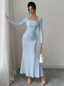 Detail of square neckline and ruched waist on light blue slim fit fishtail dress