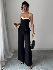 Women's chic two-piece set featuring a contrast ruffled tube top and high-waisted wide-leg pants