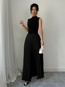 Elegant black sleeveless maxi dress with a stand collar and pleated long skirt for women