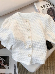 Elegant white short sleeve shirt with bubble texture fabric and pearl gold buttons