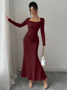 Detail of elegant wine red mermaid dress featuring square neck and ruched waistline