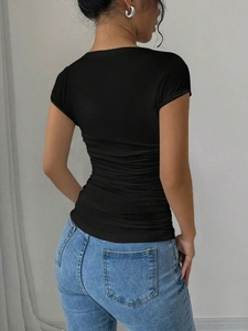 Slim fit black short sleeve T-shirt with ruched side details shown from a back view